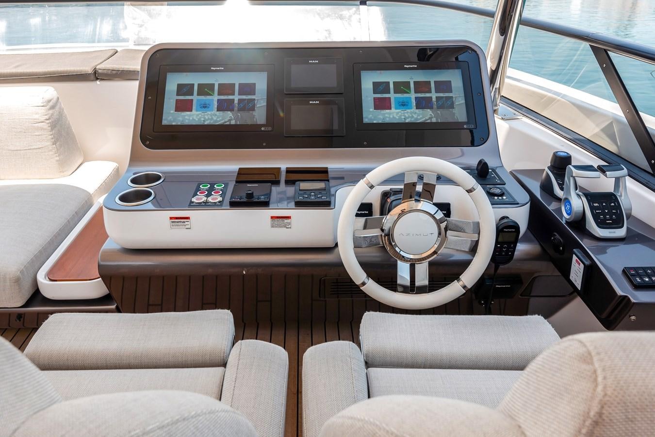 inside of a car aboard AZIMUT GRANDE 26/25 Yacht for Sale