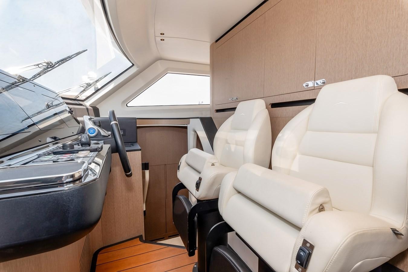 inside of a car aboard AZIMUT GRANDE 26/25 Yacht for Sale