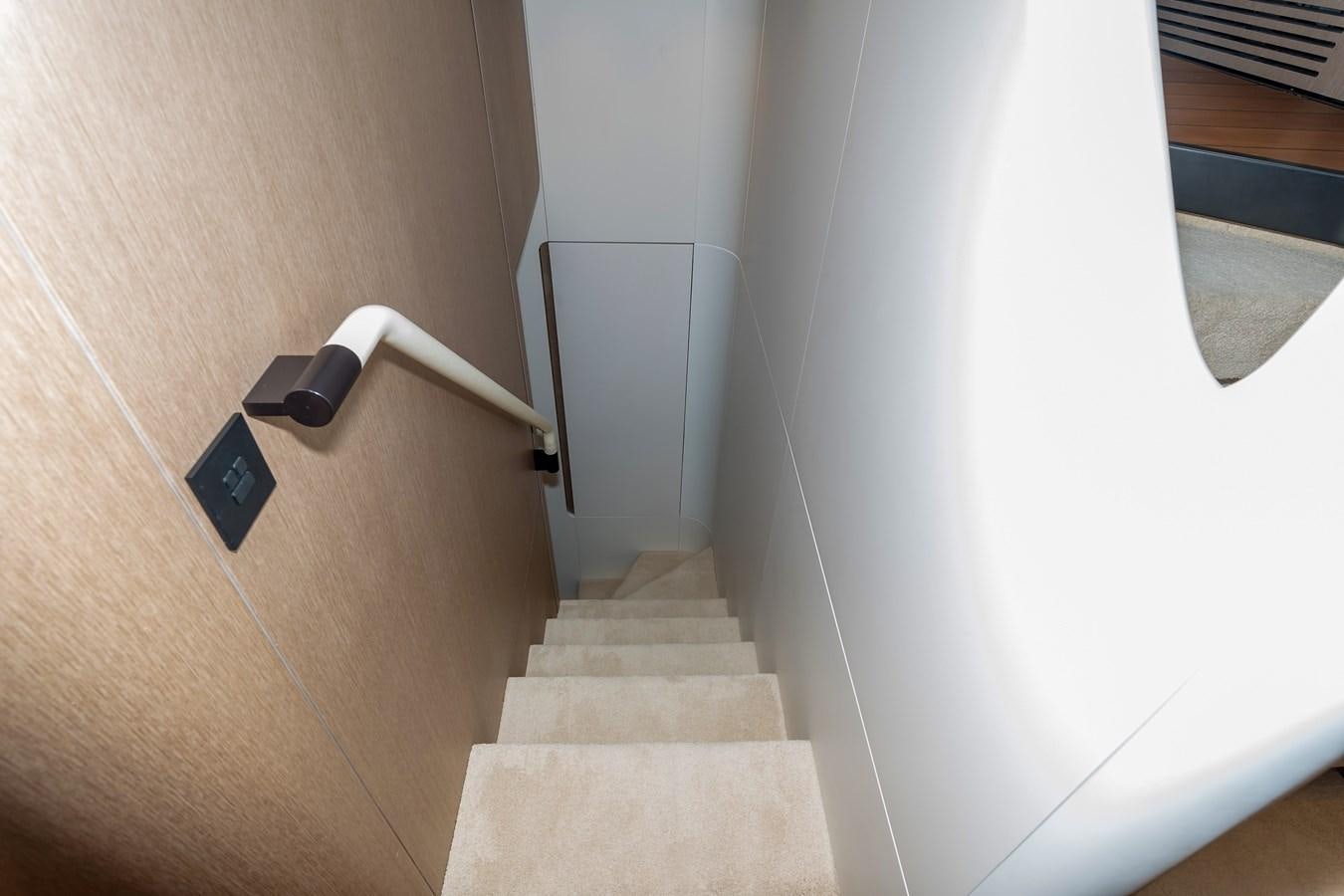 a staircase with a white railing aboard AZIMUT GRANDE 26/25 Yacht for Sale