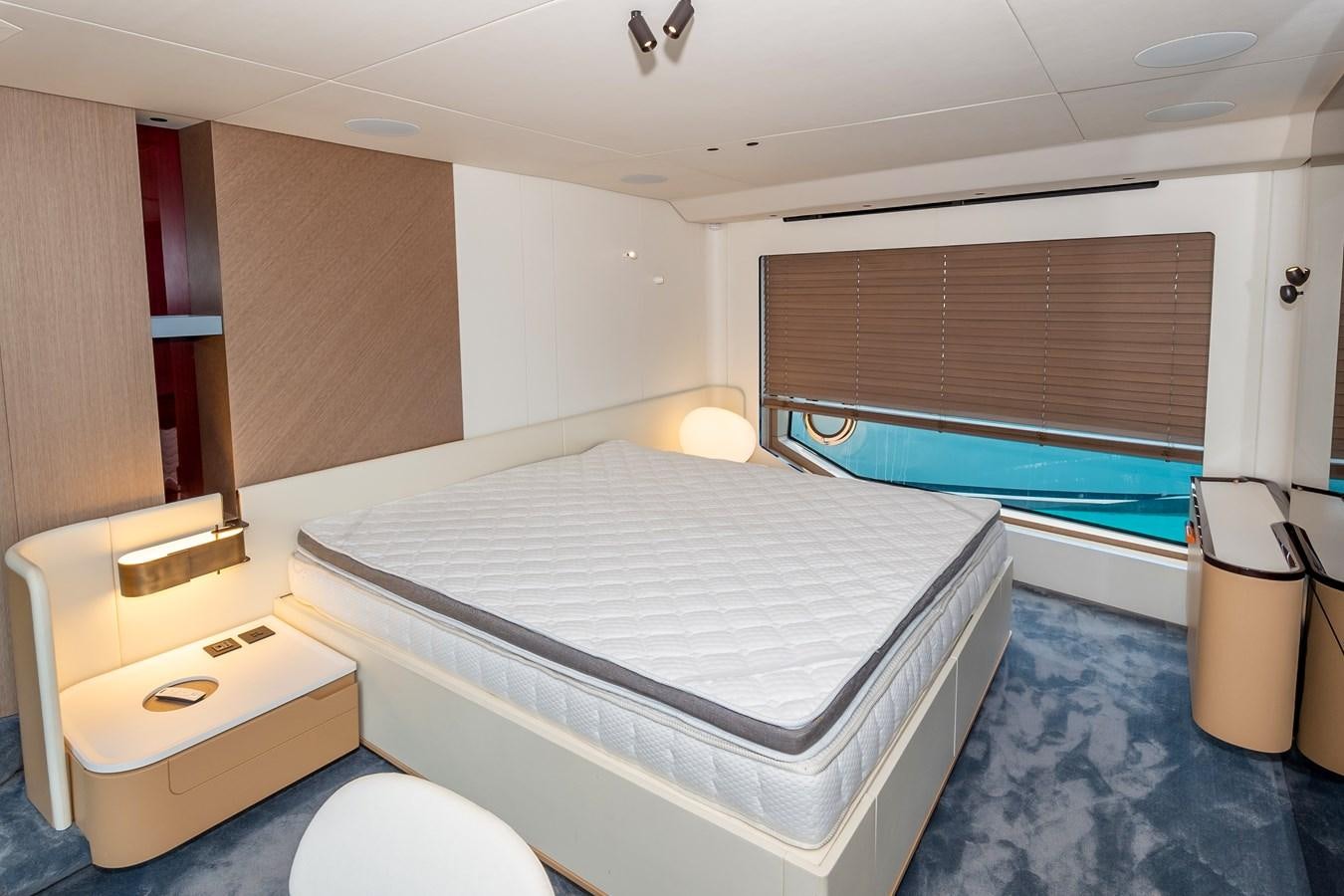 a bathroom with a large bed aboard AZIMUT GRANDE 26/25 Yacht for Sale