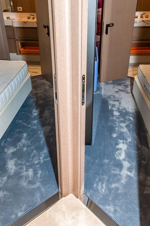 a hallway with a blue floor aboard AZIMUT GRANDE 26/25 Yacht for Sale