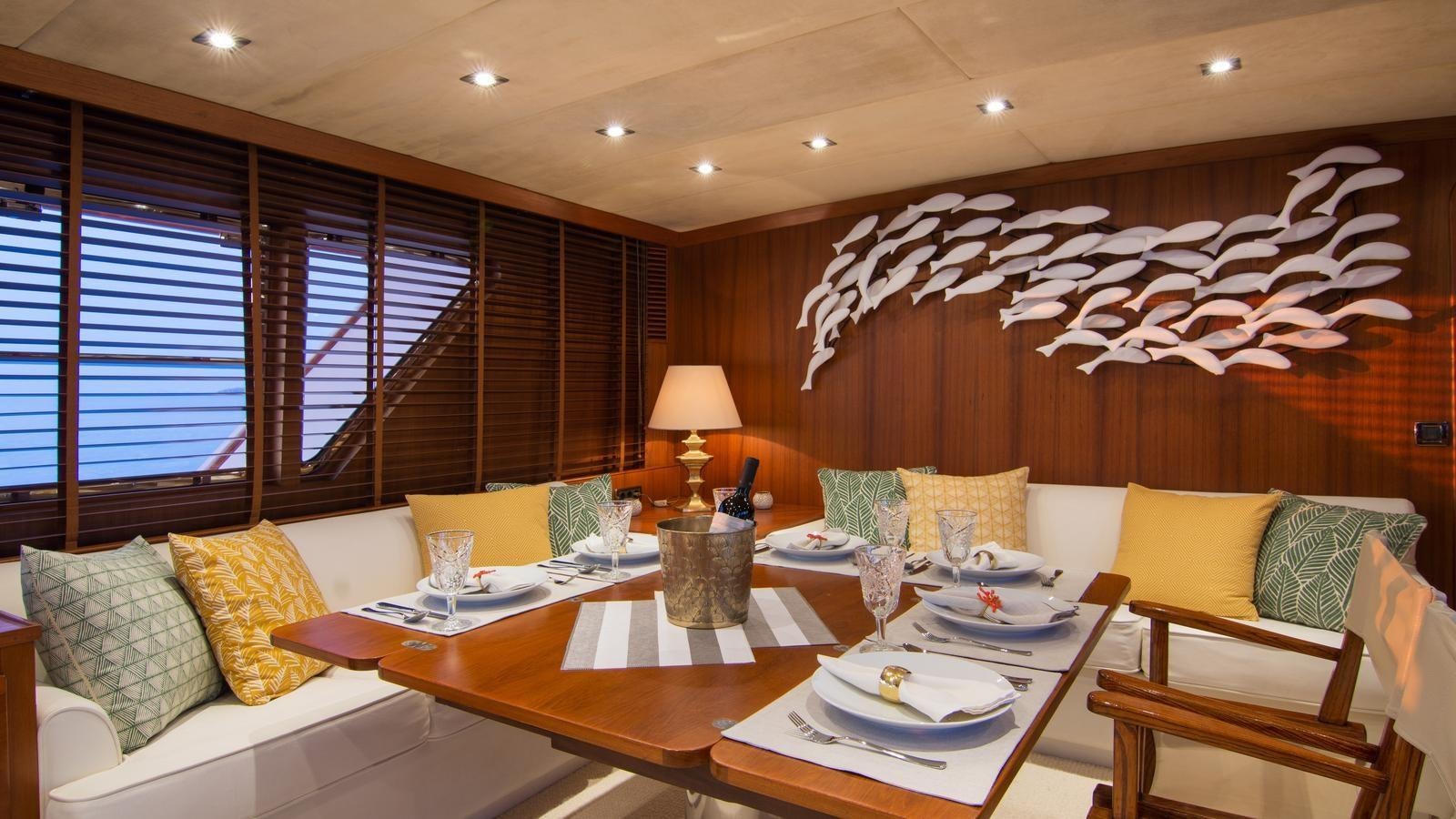 a living room with a large window aboard OCEANE II Yacht for Sale