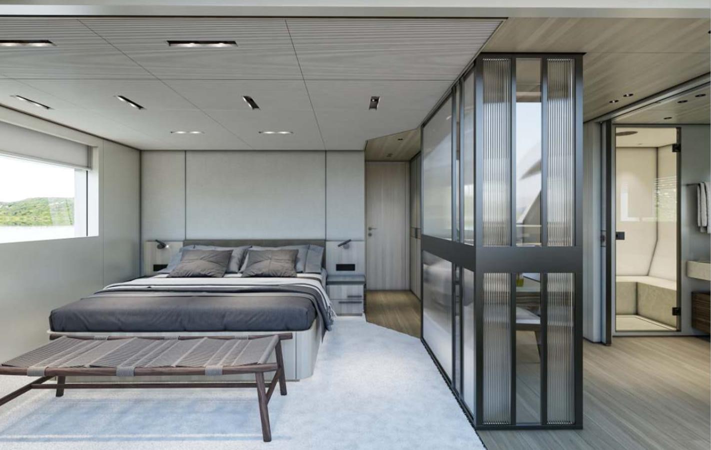 a large room with a bed and a table aboard MANDA  S09 Yacht for Sale