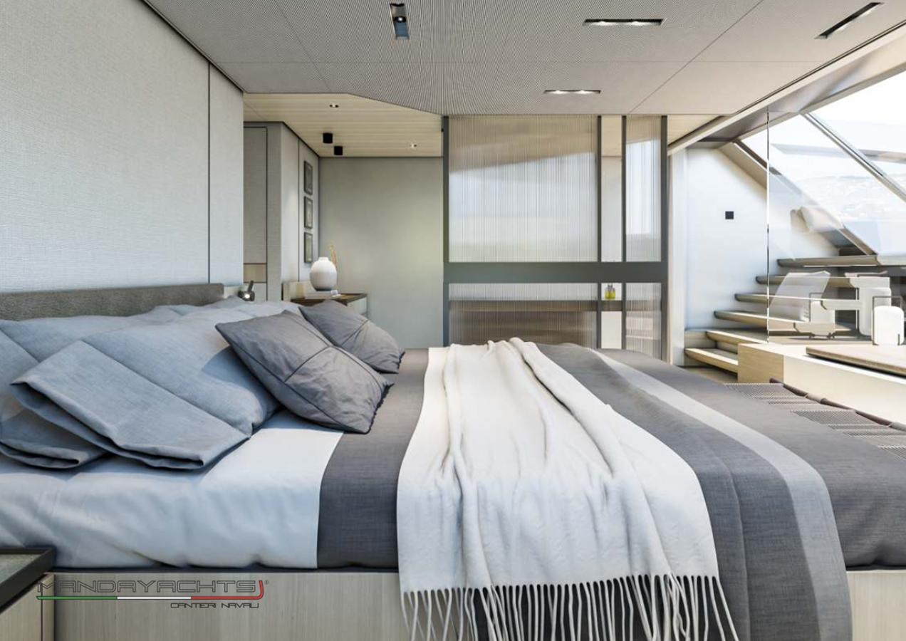 a room with a bed and a desk aboard MANDA  S09 Yacht for Sale