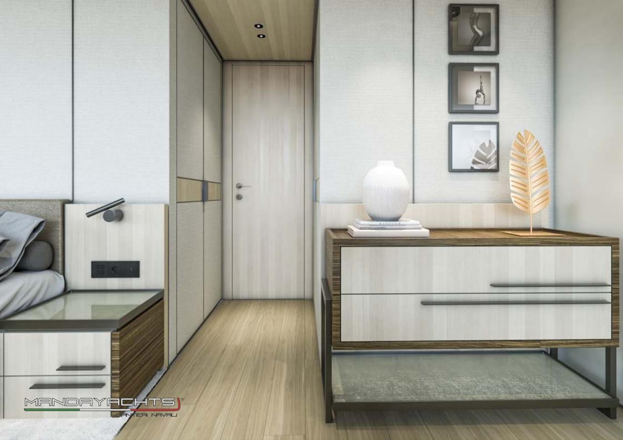 a room with a wood floor and a wood cabinet with a white vase on it aboard MANDA  S09 Yacht for Sale