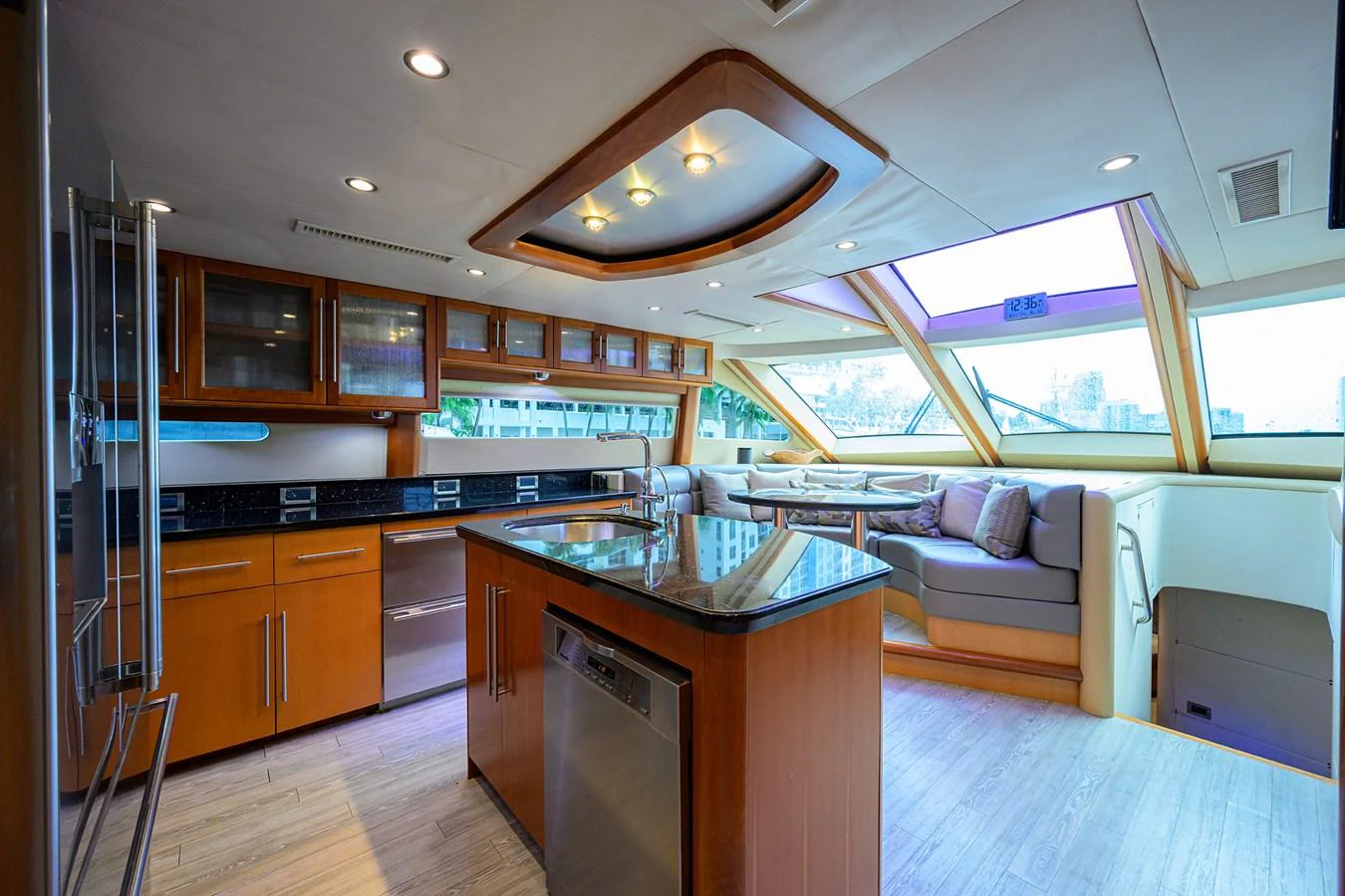 a kitchen with a large island aboard LIVING THE DREAM Yacht for Sale