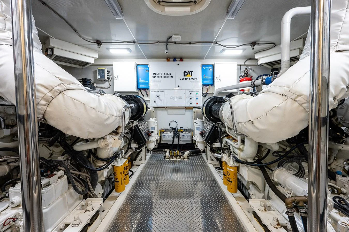 a large white machine in a room aboard LIVING THE DREAM Yacht for Sale
