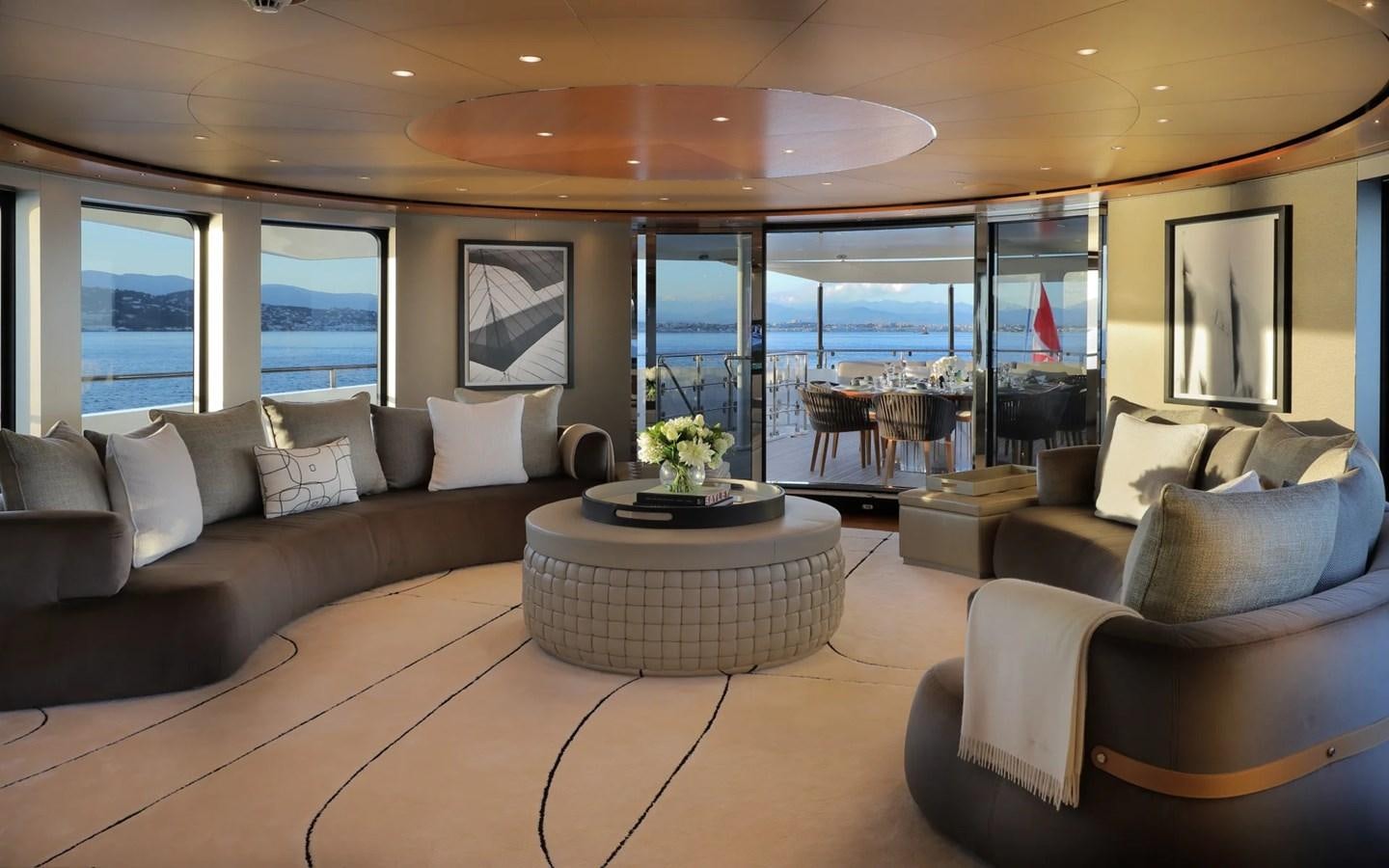 a living room with a large window aboard MADO Yacht for Sale