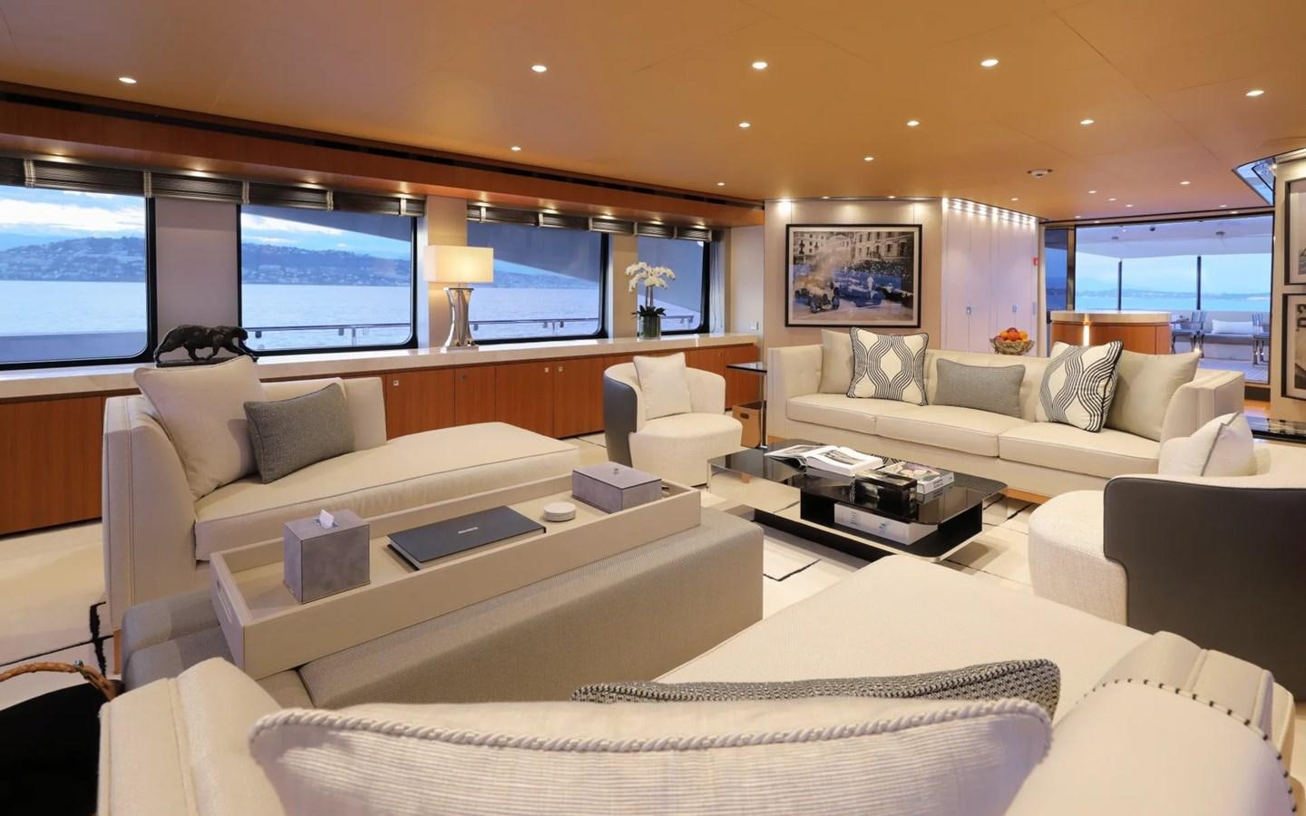 a living room with a large window aboard MADO Yacht for Sale