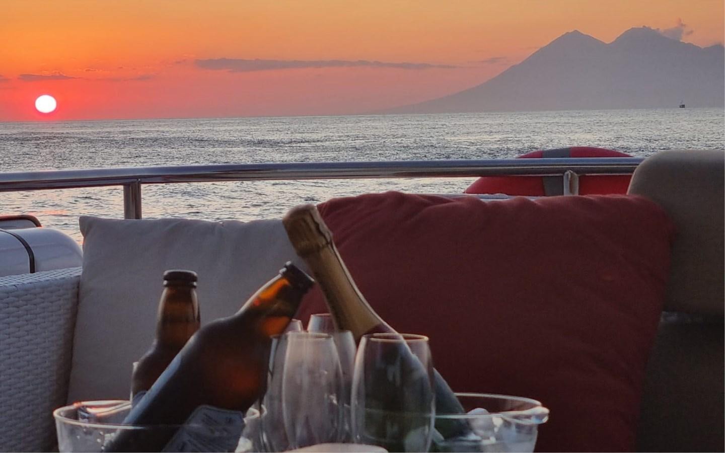 a bottle of liquor on a boat aboard ONEIRONAUT Yacht for Sale