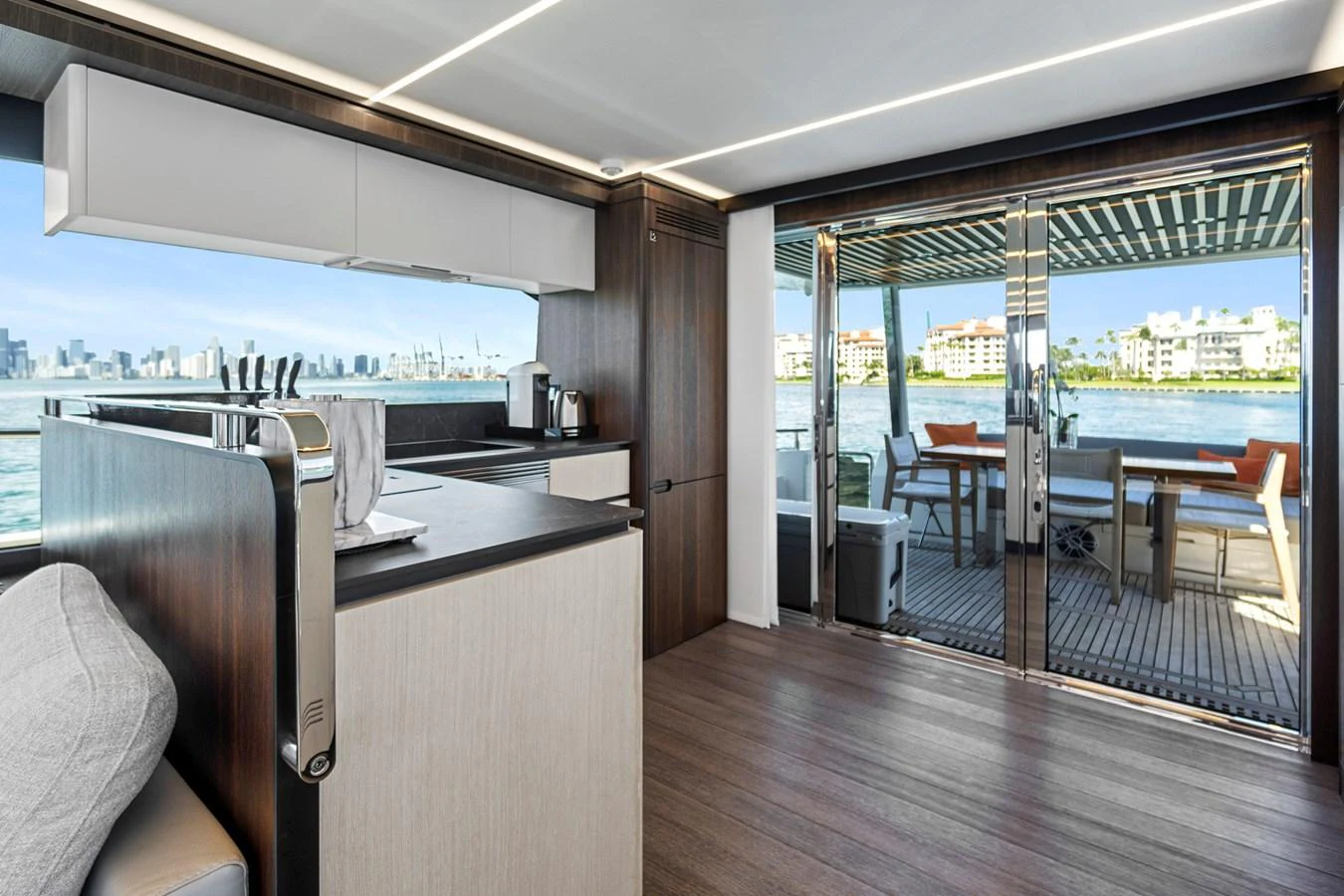 a kitchen with a large window aboard SMILE Yacht for Sale