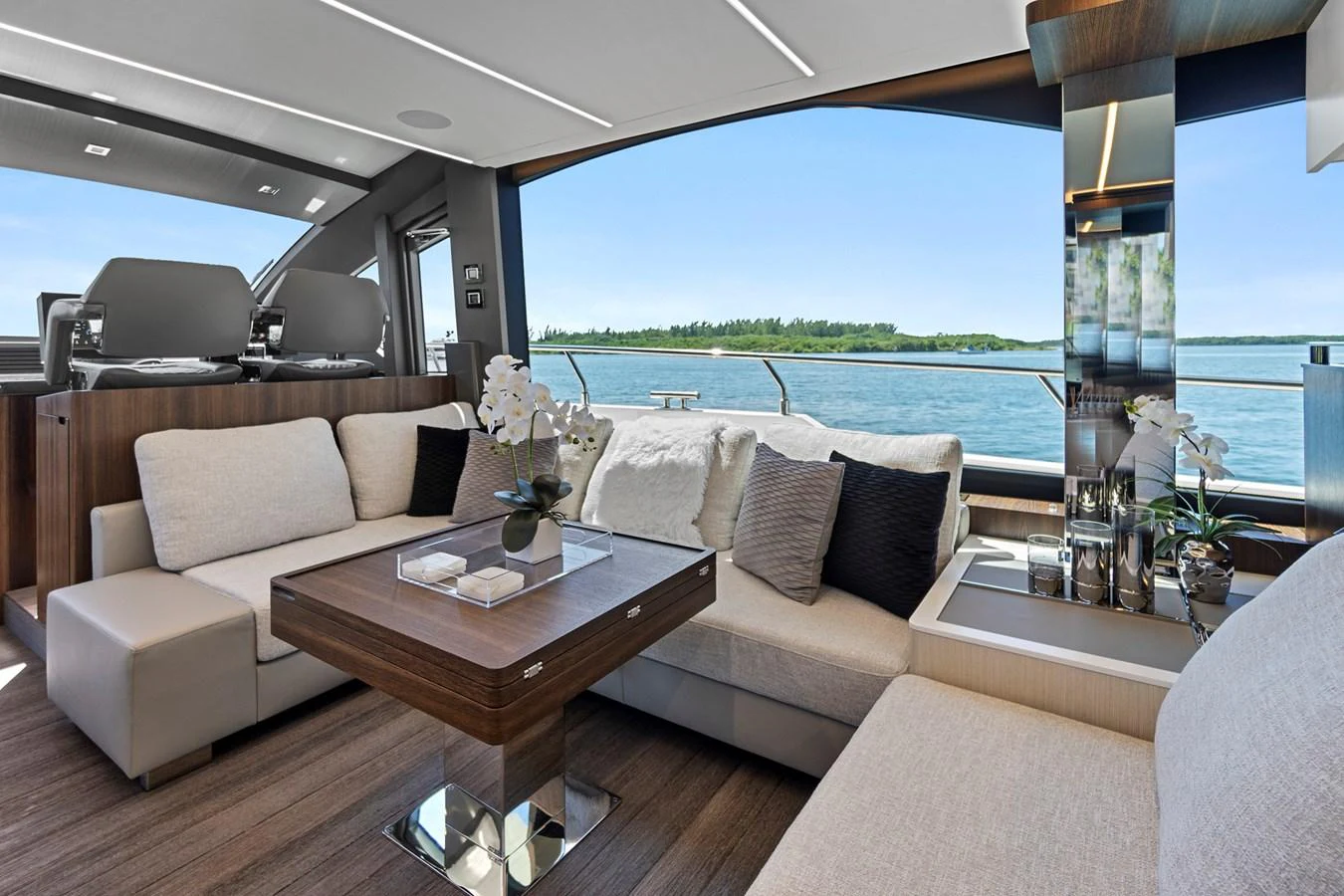 a living room with a large window aboard SMILE Yacht for Sale