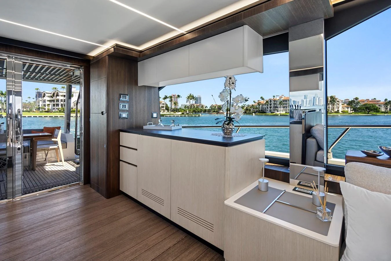 a kitchen with a large window aboard SMILE Yacht for Sale