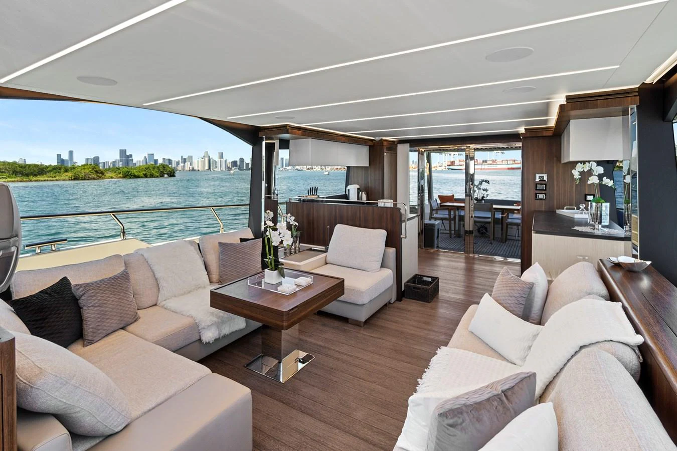 a living room with a large window aboard SMILE Yacht for Sale