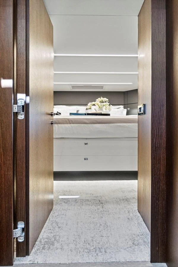 a white cabinet with a shelf aboard SMILE Yacht for Sale