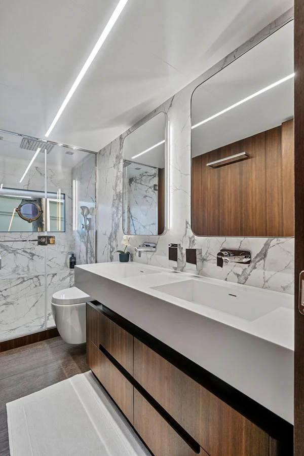 a bathroom with a sink and a toilet aboard SMILE Yacht for Sale