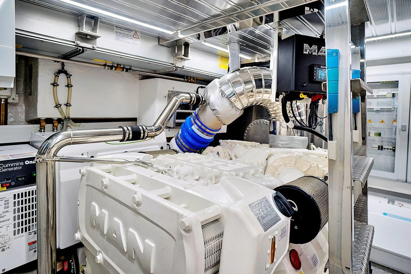 a person wearing a mask in a factory aboard SMILE Yacht for Sale