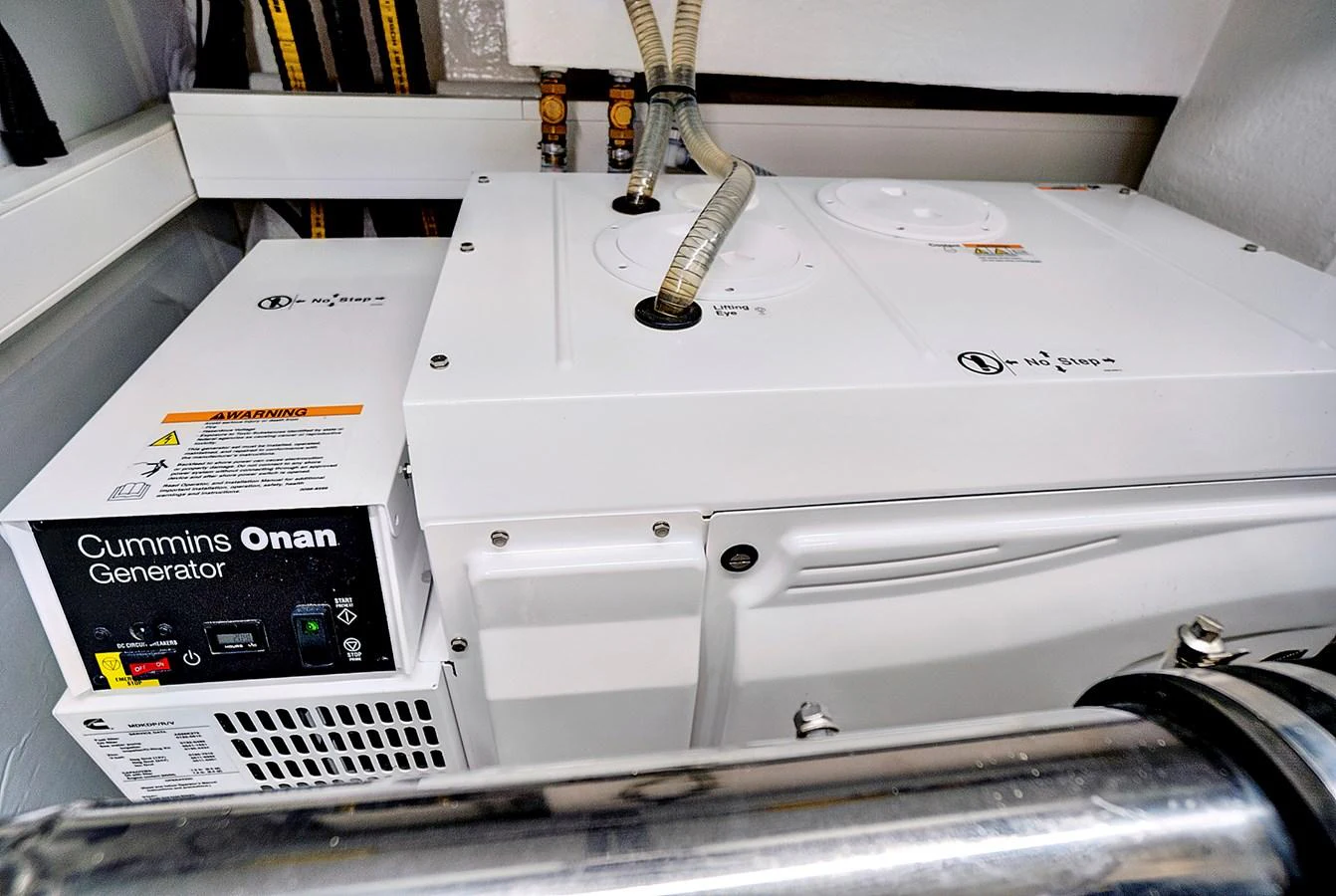 a white machine with a cable aboard SMILE Yacht for Sale