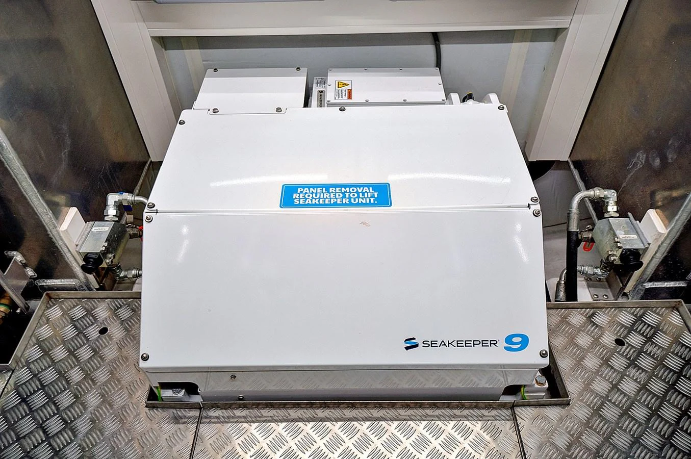 a white box with a blue label on it aboard SMILE Yacht for Sale