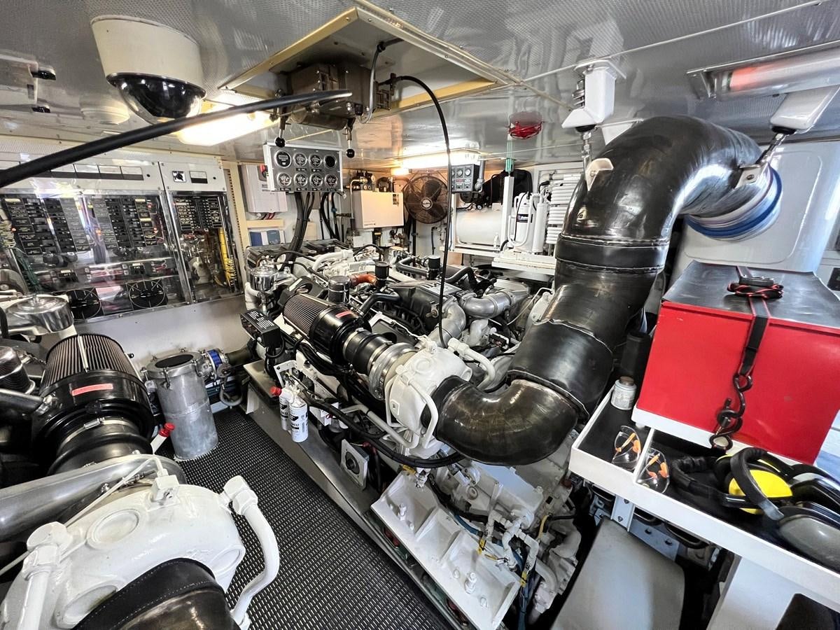 a large machine with many parts aboard 2001 BROWARD RAISED PILOTHOUSE MY Yacht for Sale