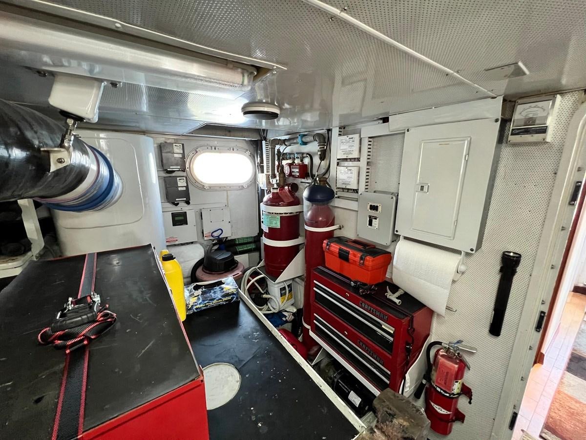 a room with machinery and equipment aboard 2001 BROWARD RAISED PILOTHOUSE MY Yacht for Sale