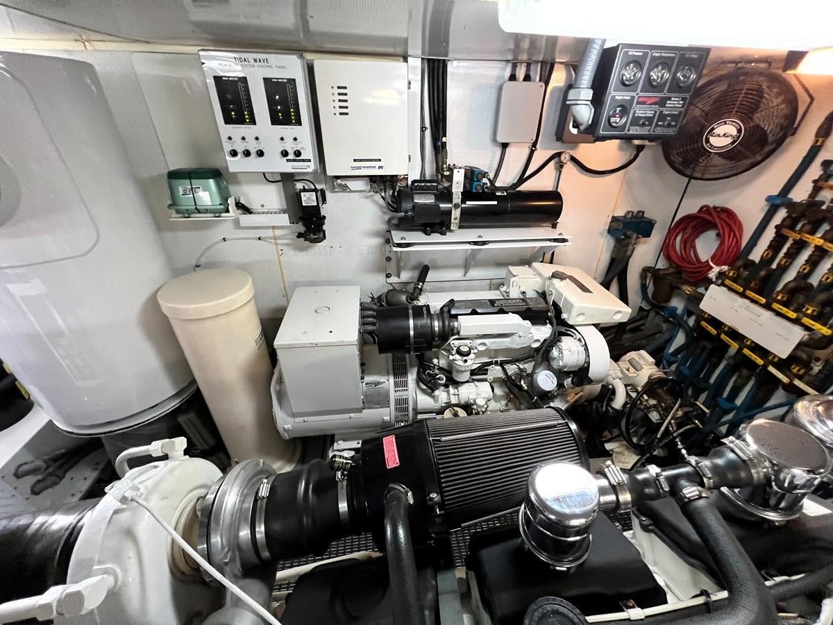 a close-up of a machine aboard 2001 BROWARD RAISED PILOTHOUSE MY Yacht for Sale