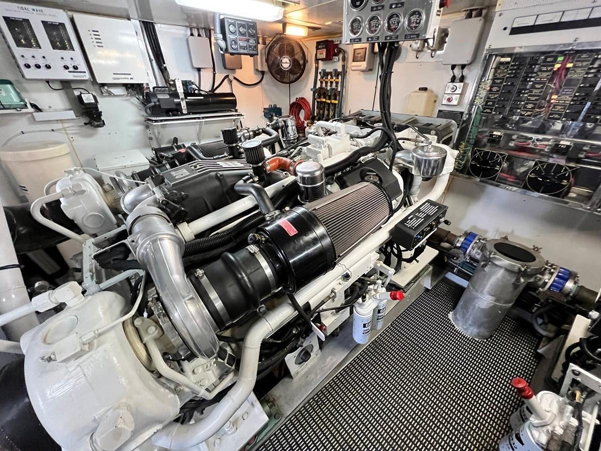 a room full of machinery aboard 2001 BROWARD RAISED PILOTHOUSE MY Yacht for Sale