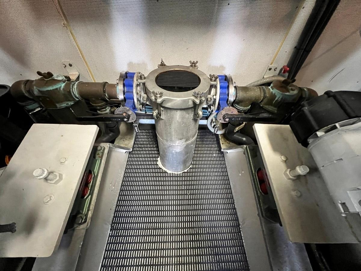 a machine in a room aboard 2001 BROWARD RAISED PILOTHOUSE MY Yacht for Sale