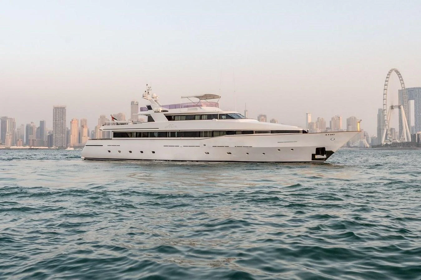 a large white boat in the water aboard ALIA 7 Yacht for Sale