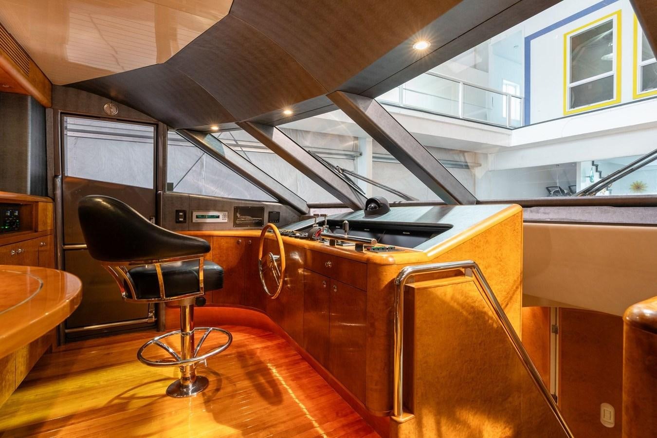 a room with a desk and a chair aboard 1996 ADMIRAL MARINE 71 Yacht for Sale