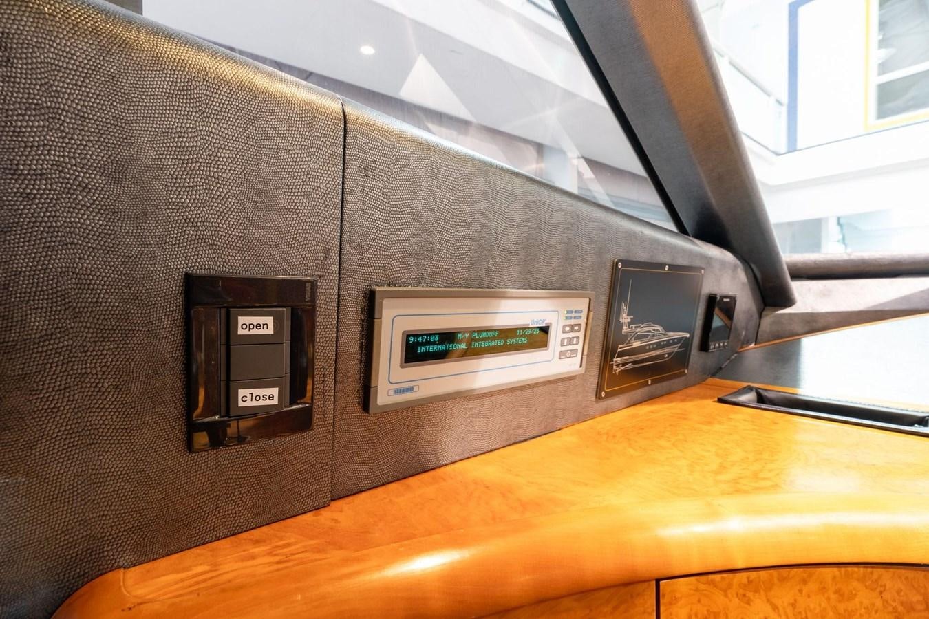 a computer tower on a table aboard 1996 ADMIRAL MARINE 71 Yacht for Sale