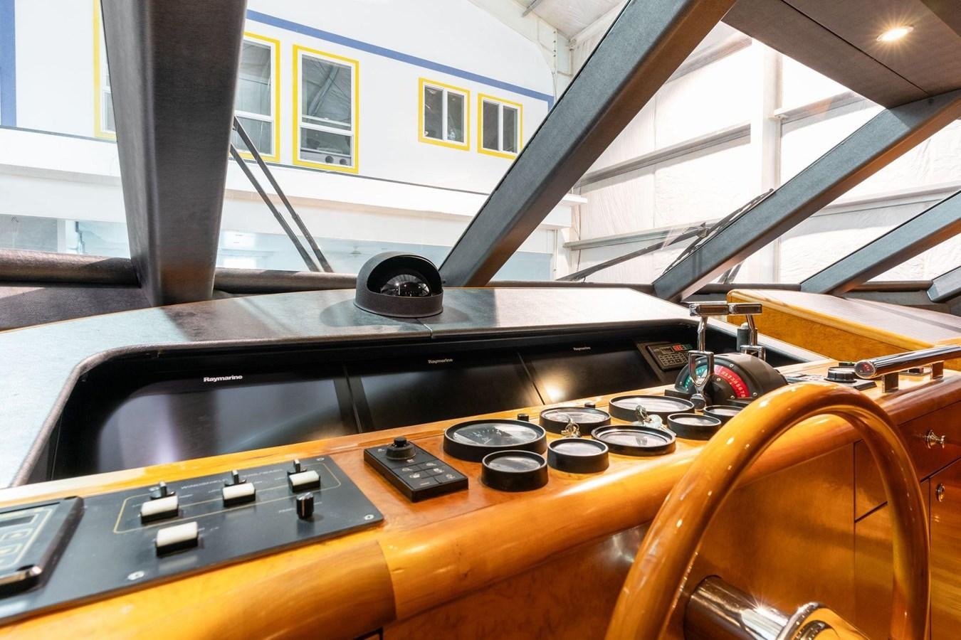 the inside of a yellow vehicle aboard 1996 ADMIRAL MARINE 71 Yacht for Sale