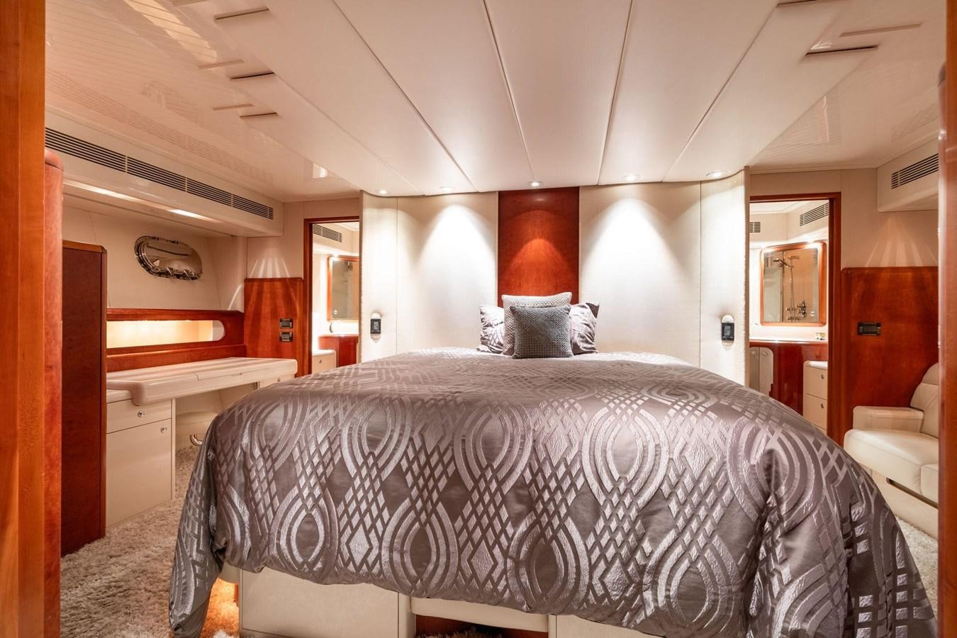 a large bed in a room aboard 1996 ADMIRAL MARINE 71 Yacht for Sale
