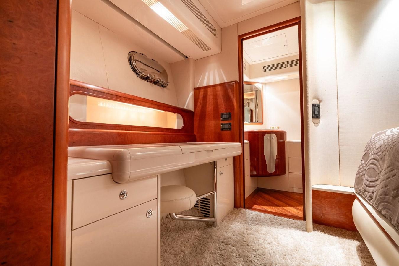 a bathroom with a sink and a mirror aboard 1996 ADMIRAL MARINE 71 Yacht for Sale