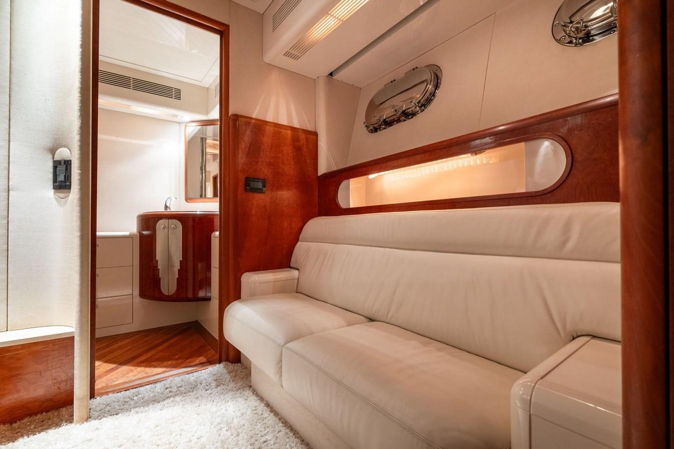 a couch in a room aboard 1996 ADMIRAL MARINE 71 Yacht for Sale