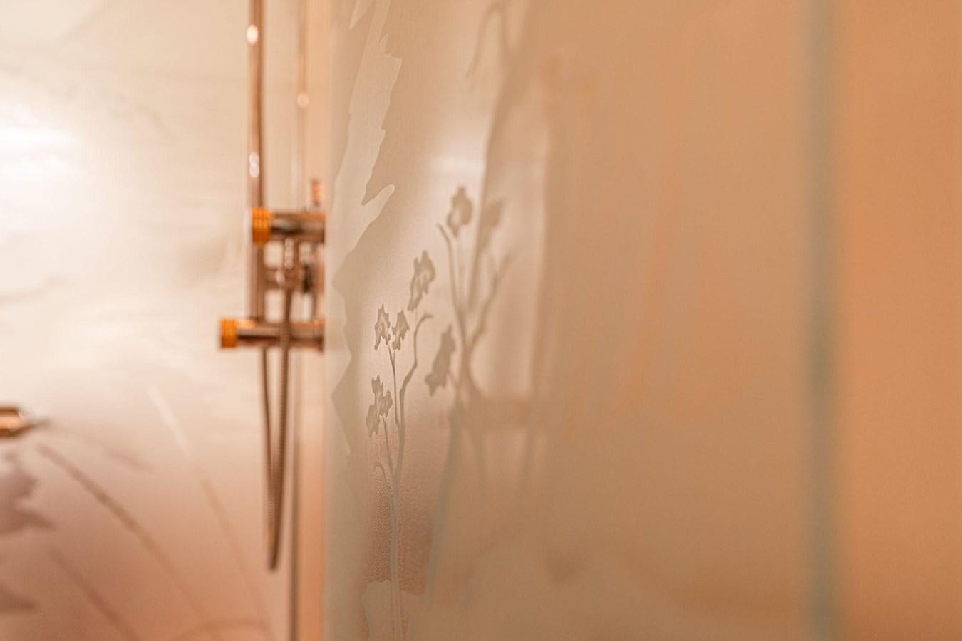 a white wall with a cross on it aboard 1996 ADMIRAL MARINE 71 Yacht for Sale