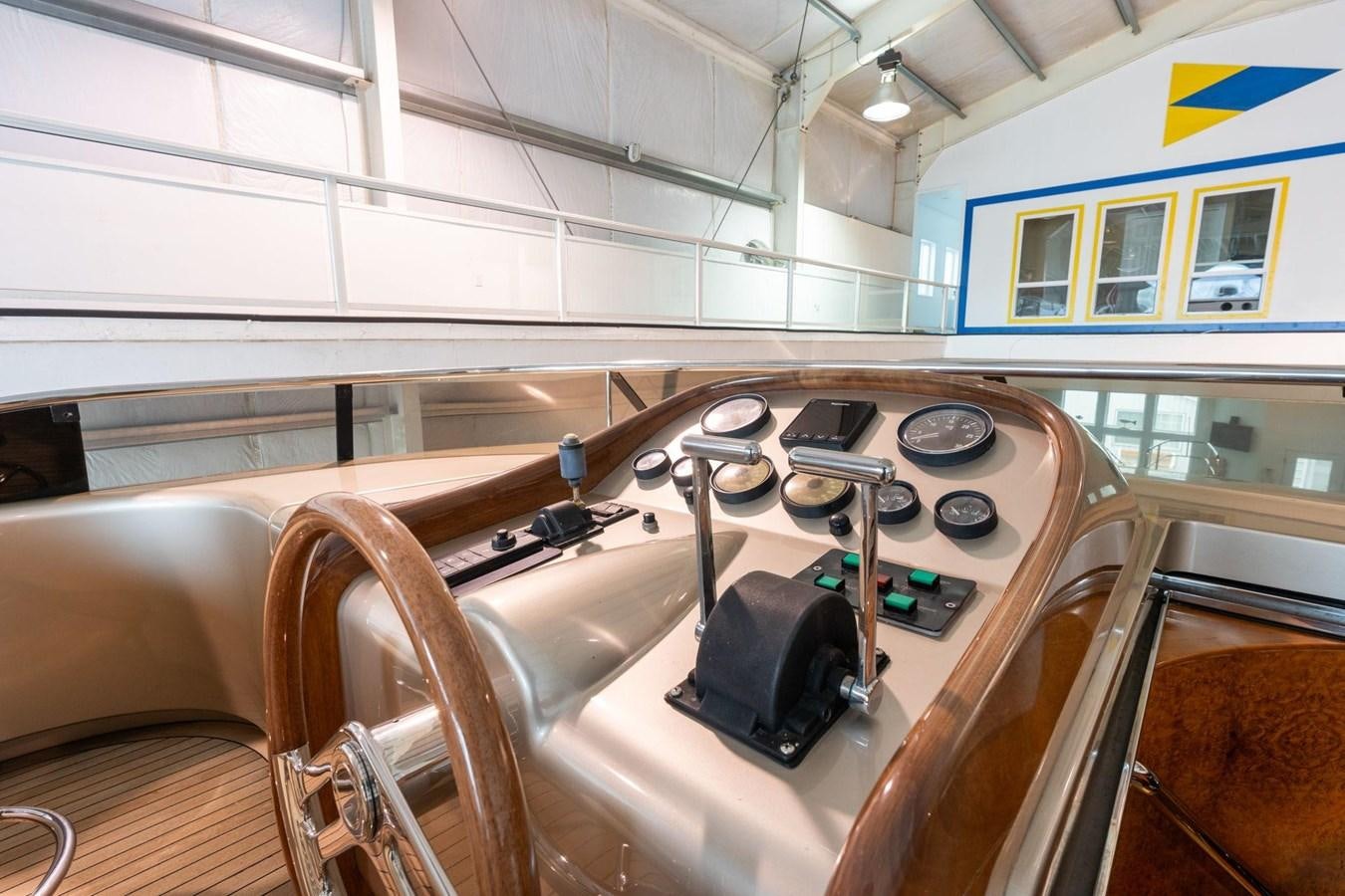 a large kitchen with a large island aboard 1996 ADMIRAL MARINE 71 Yacht for Sale