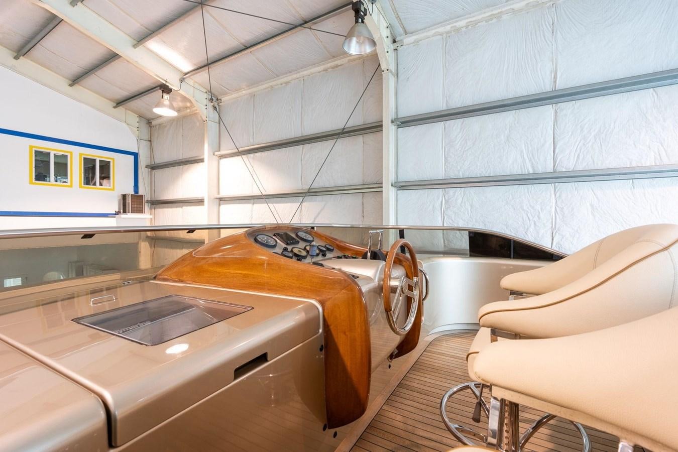 a room with a sink and a couch aboard 1996 ADMIRAL MARINE 71 Yacht for Sale