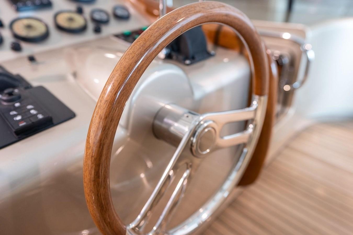 a key on a table aboard 1996 ADMIRAL MARINE 71 Yacht for Sale