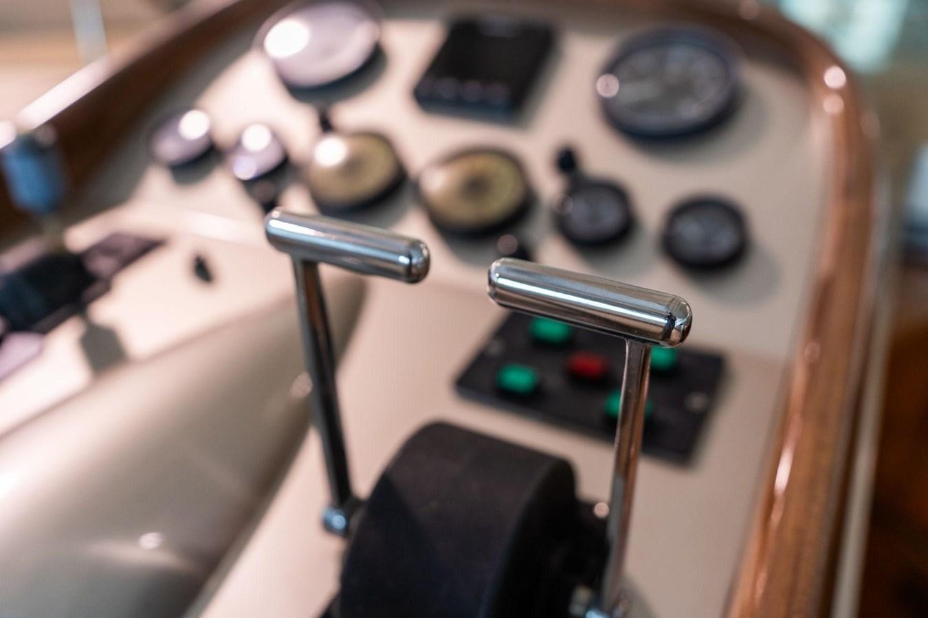 a close-up of a radio aboard 1996 ADMIRAL MARINE 71 Yacht for Sale