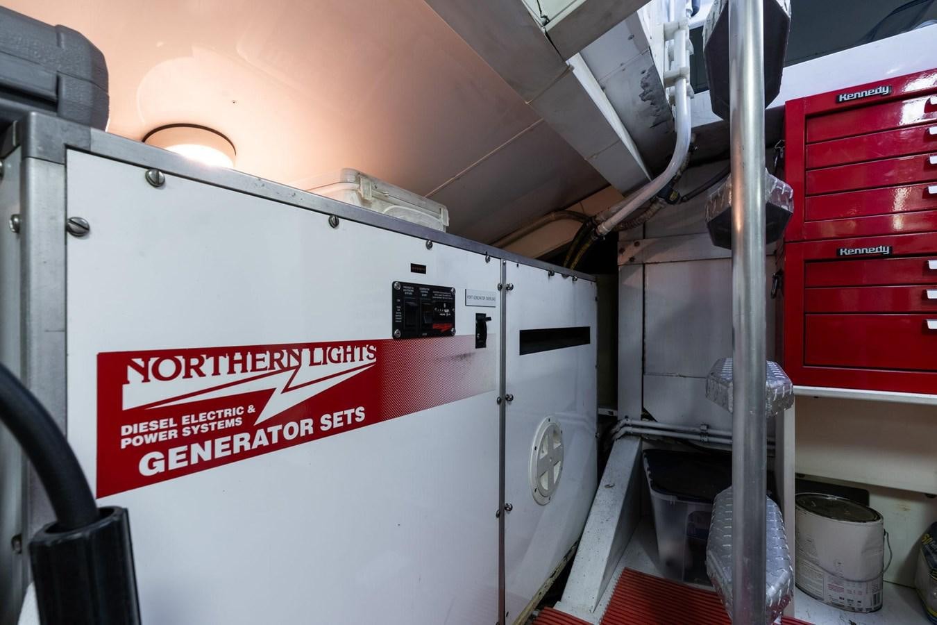 a white machine with red text aboard 1996 ADMIRAL MARINE 71 Yacht for Sale