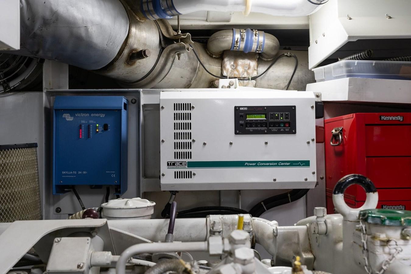 a machine in a room aboard 1996 ADMIRAL MARINE 71 Yacht for Sale