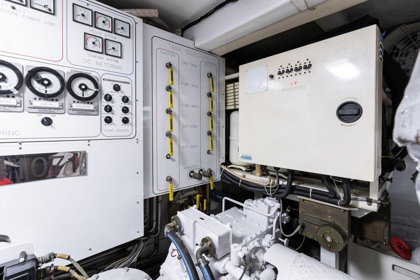 a large white machine aboard 1996 ADMIRAL MARINE 71 Yacht for Sale