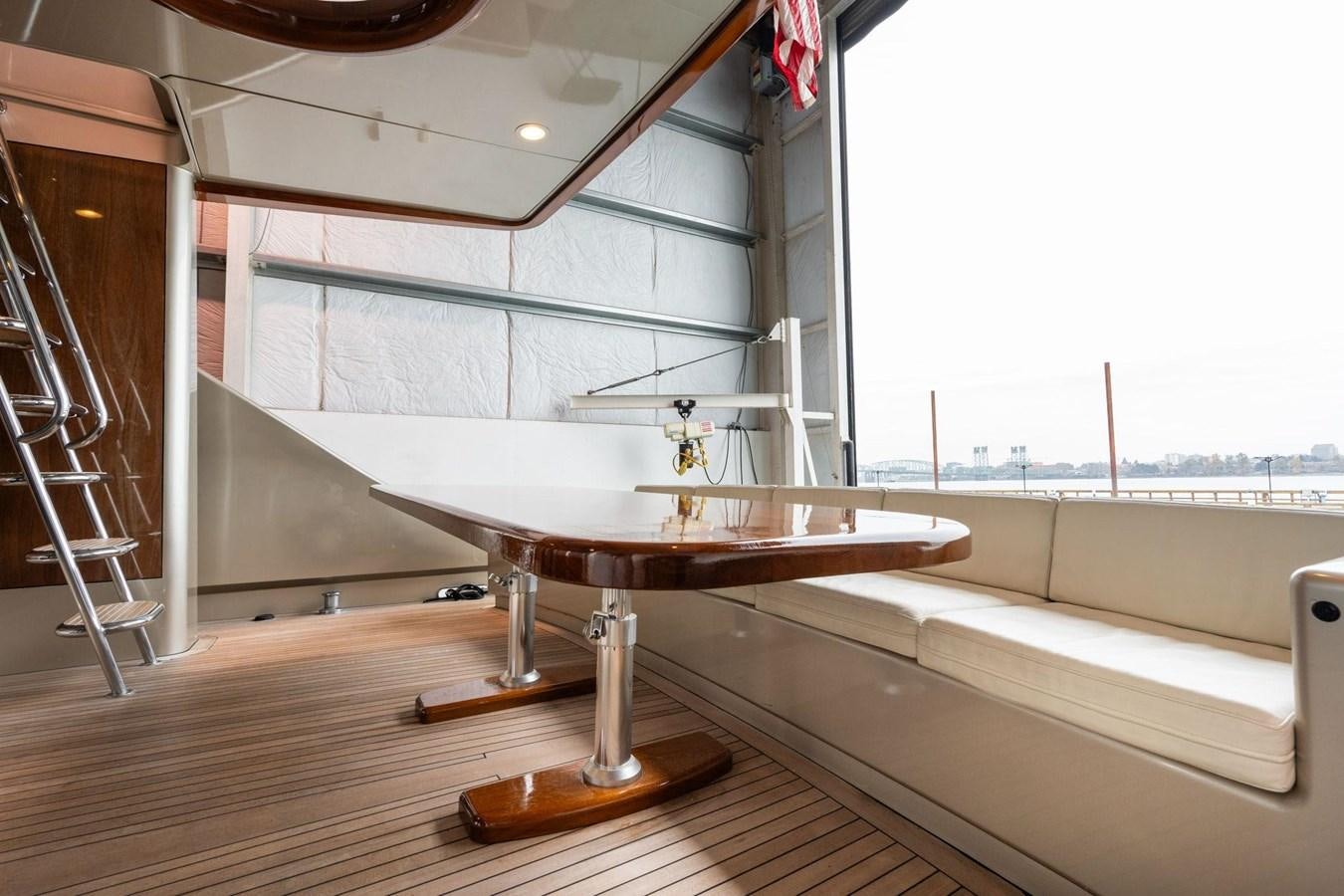 a table on a boat aboard 1996 ADMIRAL MARINE 71 Yacht for Sale