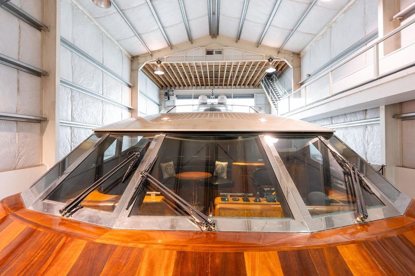 a large glass case with a boat inside aboard 1996 ADMIRAL MARINE 71 Yacht for Sale