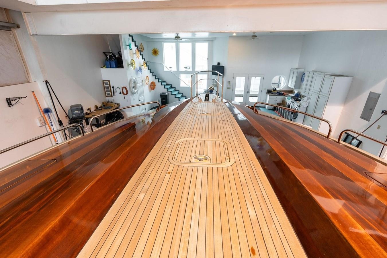 a large kitchen with wood floors aboard 1996 ADMIRAL MARINE 71 Yacht for Sale
