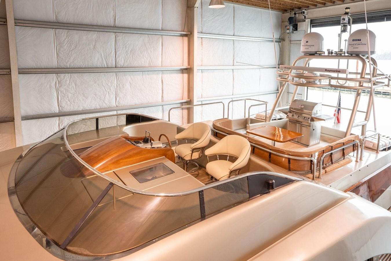 a large white machine in a room aboard 1996 ADMIRAL MARINE 71 Yacht for Sale