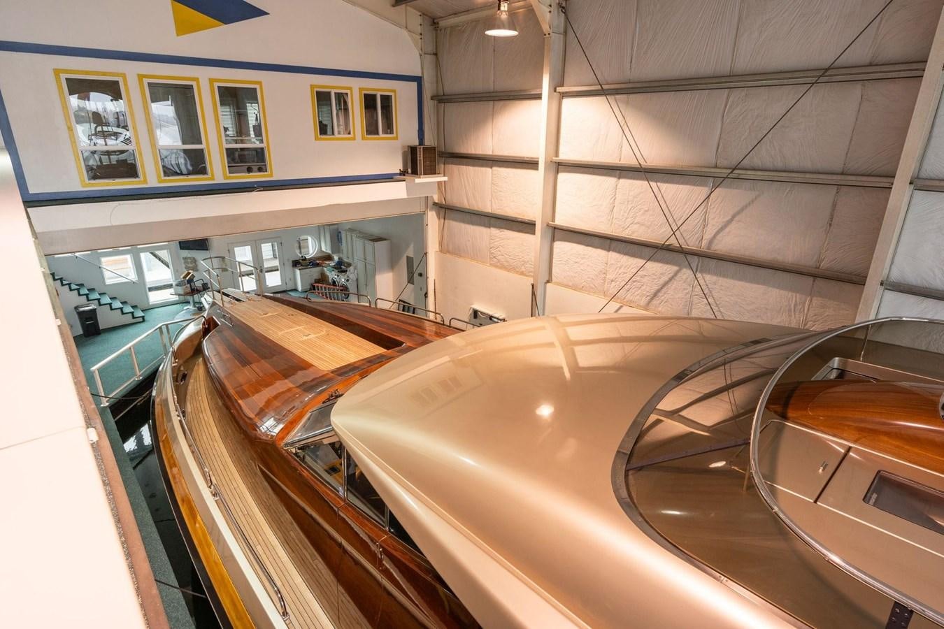 a view of a boat from the inside of a building aboard 1996 ADMIRAL MARINE 71 Yacht for Sale