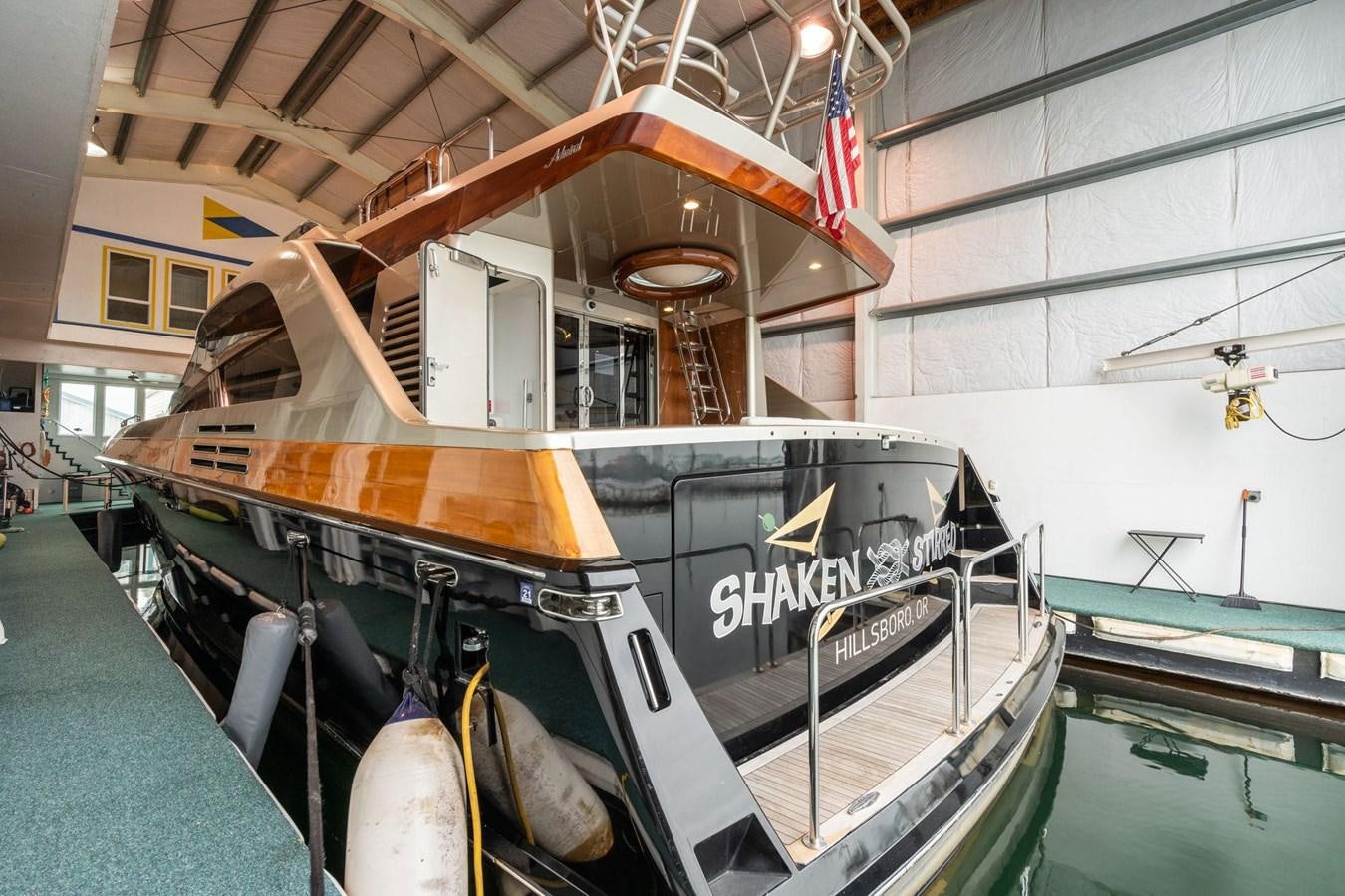 a boat in a building aboard 1996 ADMIRAL MARINE 71 Yacht for Sale
