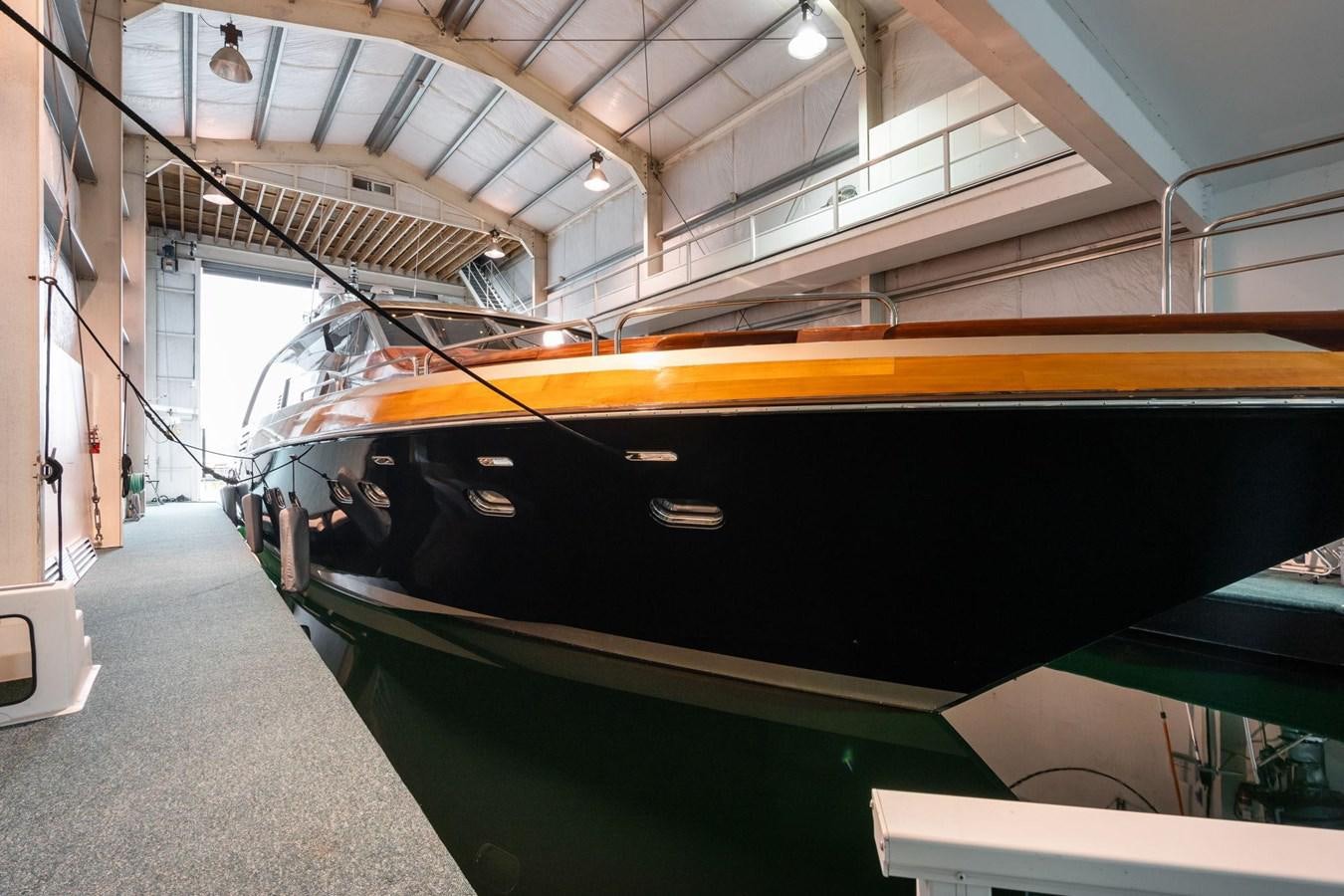 a large metal tube in a factory aboard 1996 ADMIRAL MARINE 71 Yacht for Sale